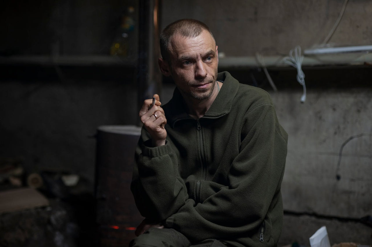 A man using a radio indoors.
